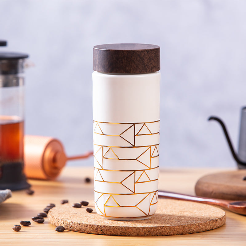 The Alchemical Signs Gold Ceramic Travel Mug by ACERA LIVEN